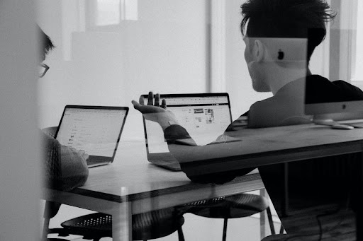 laptops_hand_bw.jpg